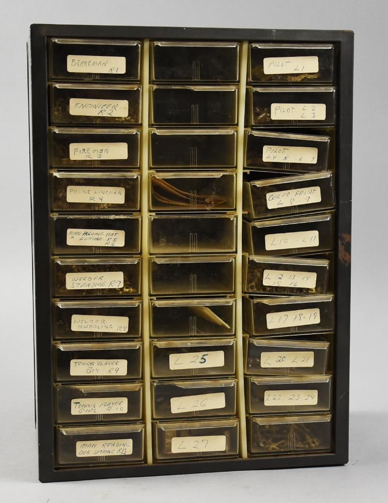 Vintage Miniature Railroad Figures and Accessories: This is a huge collection of miniatures believed to be for use with your railroad layout. Pressed steel storage bin with drawers filled with different characters and items that include gas pumps, engi