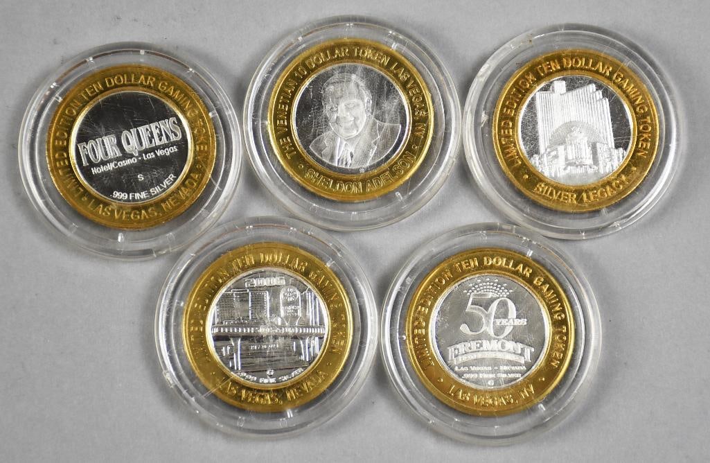 .999 Silver Strike Casino $10 Gaming Tokens Ltd. Ed.: All of these tokens are limited edition. There are 4 Queens, Sheldon Adelson, Fremont and Nevada Wildlife. Each is a $10 gaming token and will come in these plastic cases. Four are marked 999 fine on