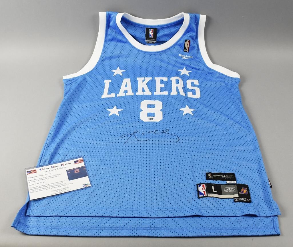 Kobe Bryant Signed Official NBA Jersey w/ COA, Hologram: This awesome jersey was signed by the amazing Laker?Kobe Bryant (1978-2020). It is an official NBA light blue jersey, Hardwood Classics Team Apparel. It comes with the Universal Sports Authority COA