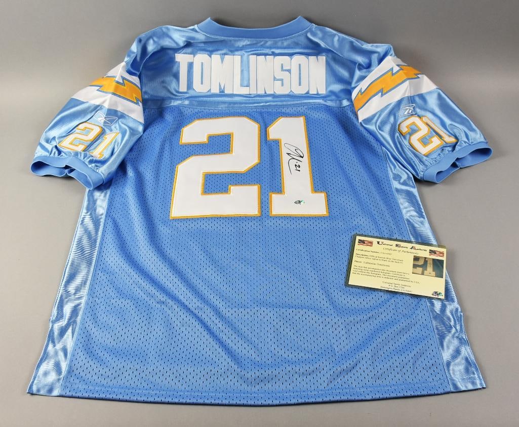 LaDainian Tomlinson Signed Chargers Jersey w/ COA, Sticker: Running back for the San Diego Chargers, LaDainian Tomlinson signed this throwback jersey. Number 21, signed in black in the number 1. Comes with a Universal Sports Authority COA with hologram sticker