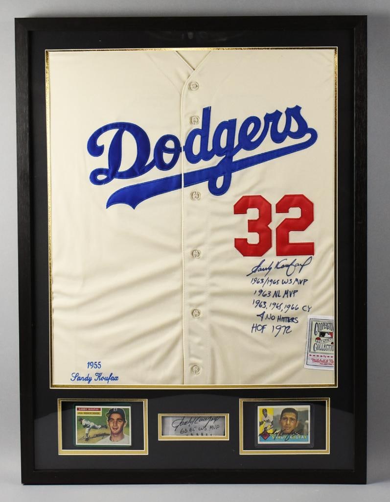 Sandy Koufax Signed Memorabilia in Shadowbox: The great Sandy Koufax signed all of this terrific memorabilia and it has been nicely framed. Shadowbox frame with his signed number 32 jersey along with career highlights, all written by Koufax