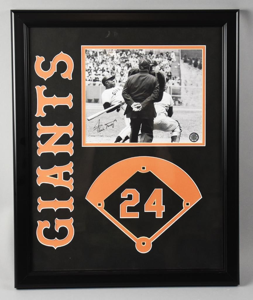 Willie Mays Signed Photograph Shadowbox GFA Hologram: The Say Hey Kid, Willie Mays signed this photo of himself dodging a fast ball pitch. It is in a nice shadowbox style frame with his number in the middle of the baseball diamond and the Giants. It is