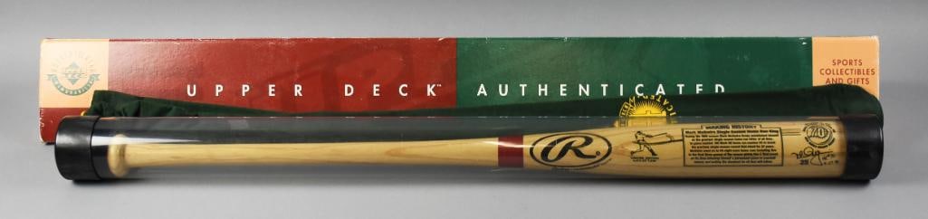 Mark McGwire Signed HR Commemorative Bat, Hologram Sticker: Terrific baseball bat signed by First Baseman Mark "Big Mac" McGwire. Rawlings bat is a commemorative bat honoring McGwire's 70th home run of the season, Sept. 27, 1998 on his home field. It is a