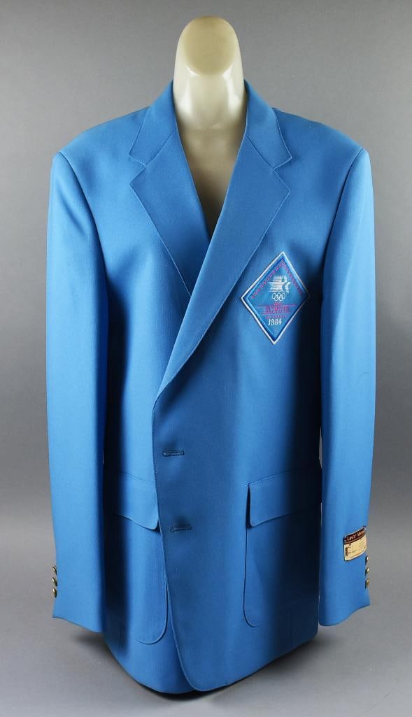 1984 Los Angeles Olympics Staff Uniform Suit Jacket-NWT: Awesome piece of history for the Olympics. The 1984 Olympics were held in Los Angeles, just as they will be in 2028. This is a staff jacket made by Levi's in a 44L. It retains the original hard paper