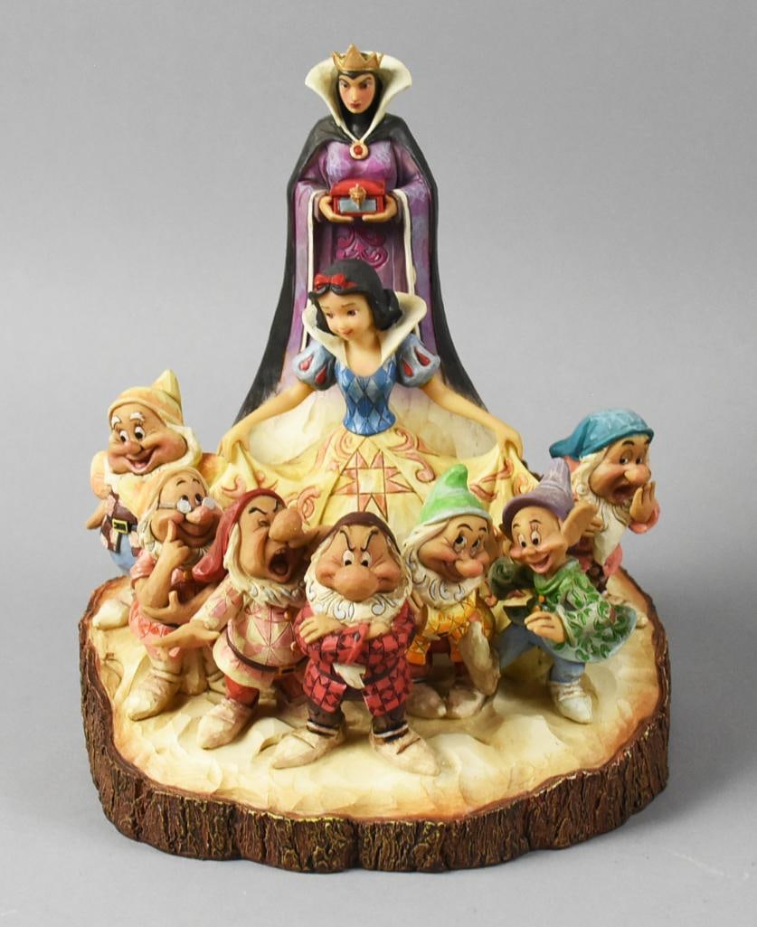 Enesco Disney Showcase Wood Carved Snow White MIB NOS: Lot is for a darling Disney Showcase figure from Enesco. It is a Wood Carved Snow White, with Snow, all the dwarfs and the Wicked Queen. The bottom reads "The One That Started Them All". She is in
