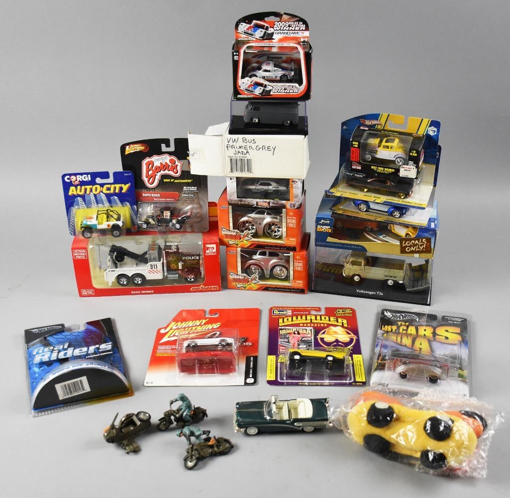 Assorted Johnny Lightning, Corgi, Hot Wheels & More MIP NOS: This is a great assortment of die-cast vehicles with most being mint in package. Some of the pieces include Majorette, Hot Wheels, Johnny Lightning and more. There is also a plush weiner mobile, loose