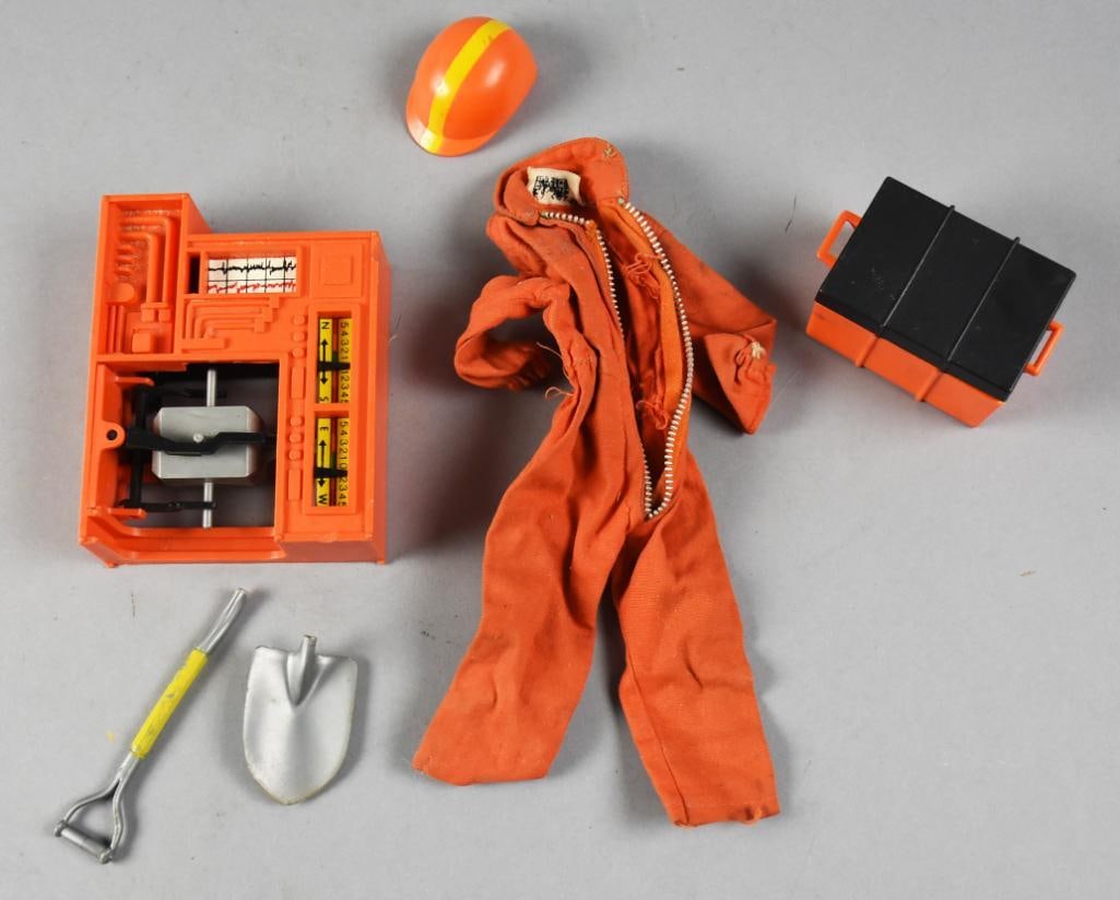 Vintage GI Joe Orange Jumpsuit & Accessories: Lot is for what appears to be an original 1970s GI Joe orange jumpsuit from Hasbro. Suit includes a shovel, hard hat, seismograph and chest.