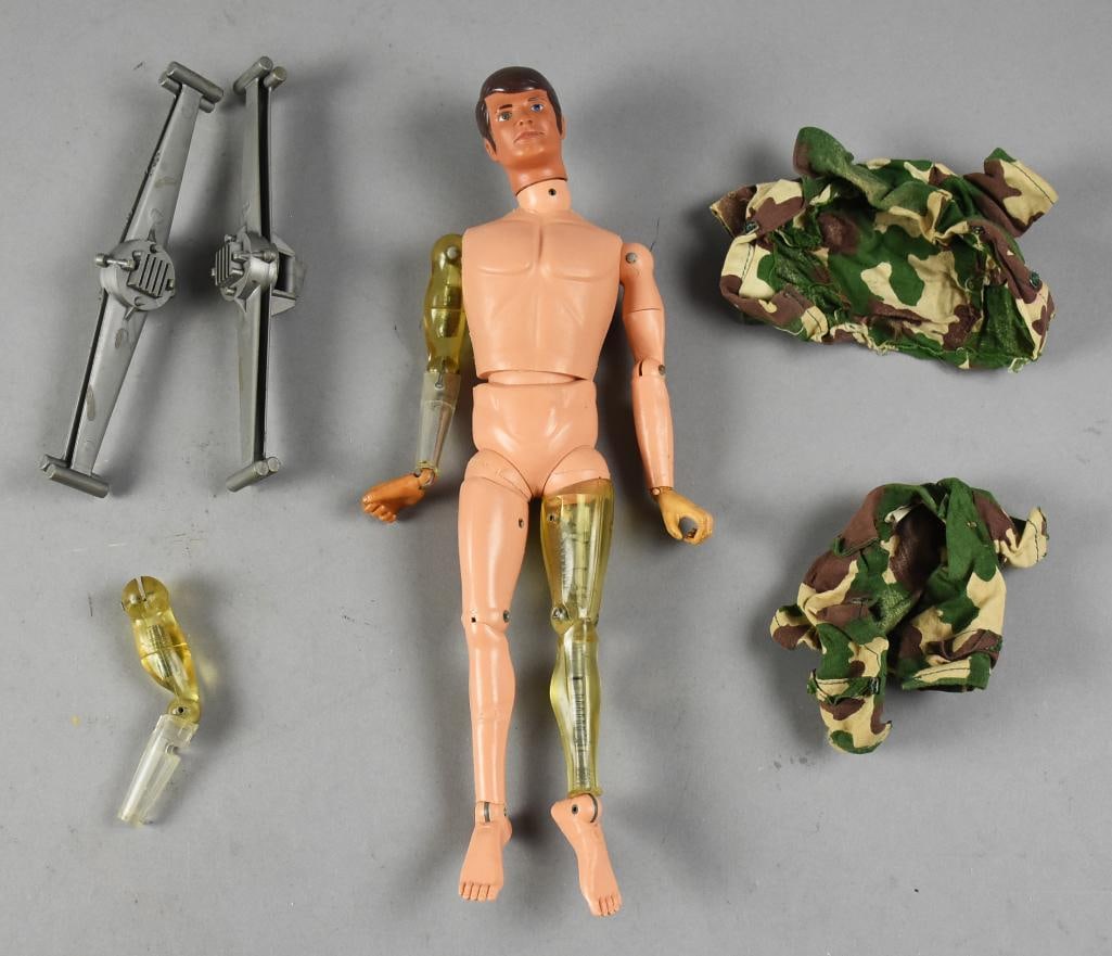 Vintage Hasbro GI Joe Mike Powers Atomic Action Figure: Lot is for a vintage GI Joe Mike Powers action figure doll. He is atomic Mike with bionic arm and leg with lot including an additional arm with no hand, two fatigue jackets and hand held helicopter.