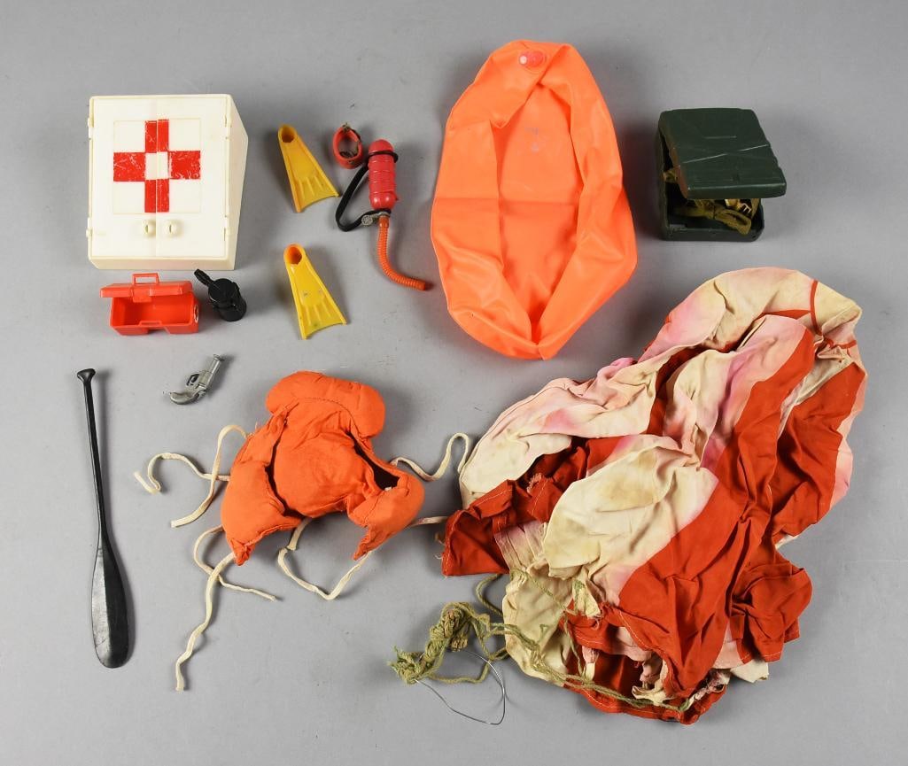 Vintage GI Joe Adventure Team Accessories: This lot is for a grouping of vintage GI Joe accessories. Believe these pieces are for the Adventure Team and include a parachute, life jacket, first aid, flippers and more.