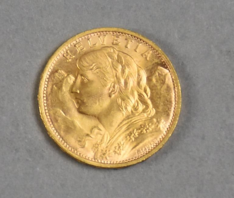 1927 Helvetia 20 Swiss Fancs Gold Coin: Lot is a 1927 Swiss Helvetia 20 francs gold coin.