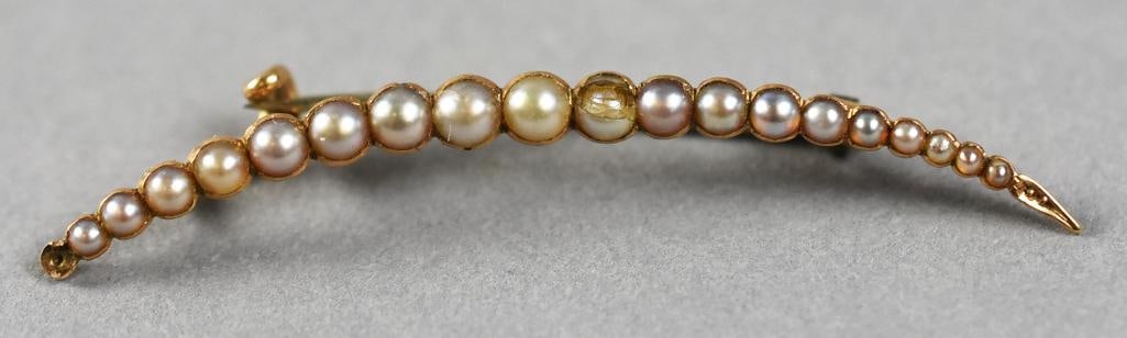 Victorian 14K Yellow Gold & Pearl Crescent Moon Brooch: Wonderful antique brooch from the Victorian era. It is a narrow crescent moon shape with graduating pearls. It has a C closure and is stamped 14 and a designer mark that appears to be a stylized