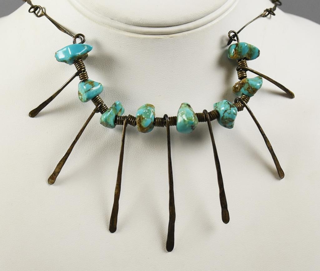 Vintage Native American Turquoise Sterling Necklace: This is a beautiful and interesting sterling and turquoise necklace. It appears Native American with flat wire work links, turquoise nuggets and hammered sterling fringe. No visible marks, measures ap