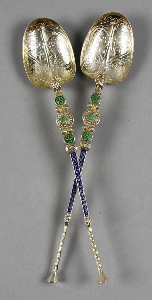 1909 Levi & Salaman Birmingham Sterling & Enamel Spoons: Gorgeous pair of spoons in sterling silver. This pair were created by Birmingham silversmiths Levi & Salaman. Handles are twist with tiger heads, scrolls and flowers accented with green and blue