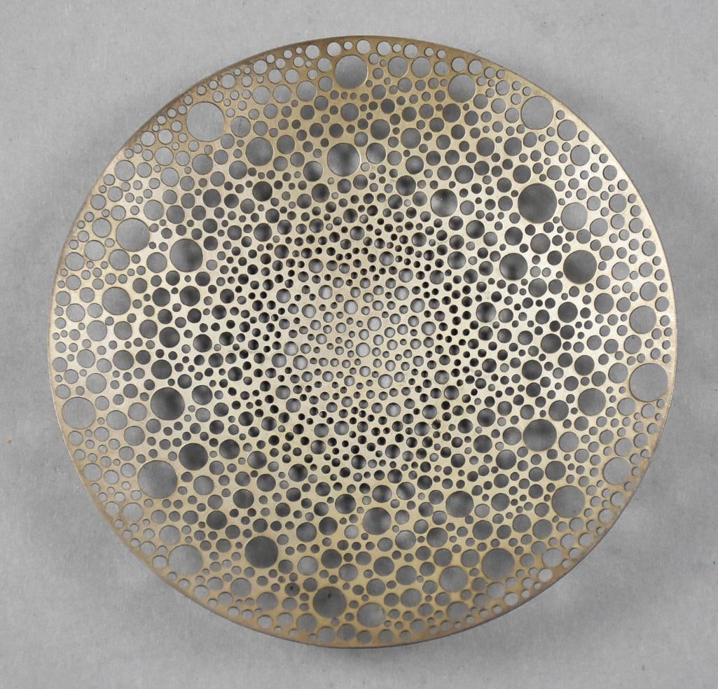 Ted Muehling Sterling Abstract Tea Strainer: Very cool piece from New York artist Ted Muehling. It is a Sterling tea strainer with laser pierced abstract circles. Well marked and measures approx. 4.25" across. No visible marks, tests as sterling