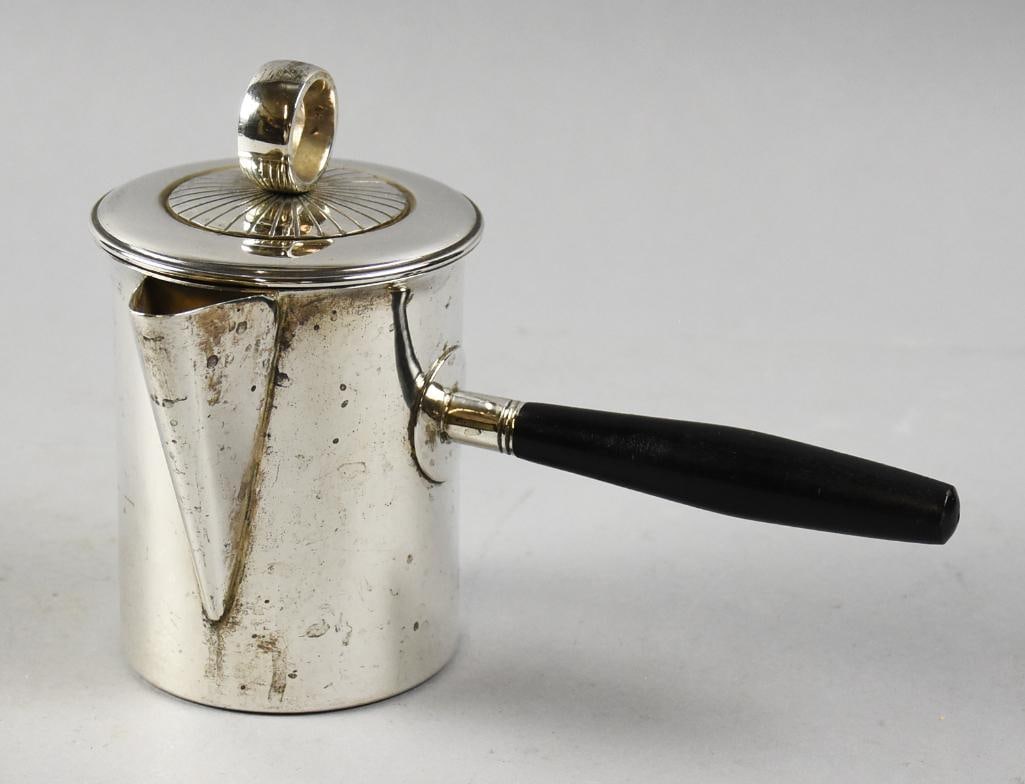 Vintage Nuram 900 Silver Coffee or Chocolate Pot: Wonderful vintage coffee or chocolate pot in 900 silver. Cylindrical pot with ring finial and handle appears ebony. Measures approx. 6" tall, 8" long including handle. Nicely marked Nuram on bottom wi