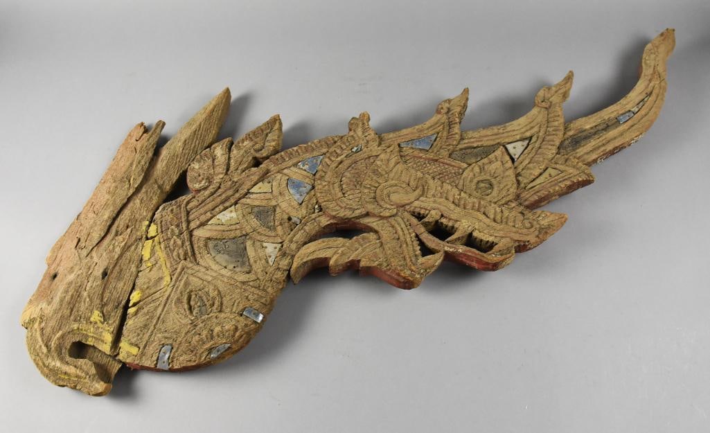 Antique Thai Wooden Naga/Dragon, Roof Finial Figure: This very cool piece appears antique and is a Thailand wood Naga or dragon roof finial. It appears hand carved with random stone inlay accents. It has been slightly modified to be able to hang on the 