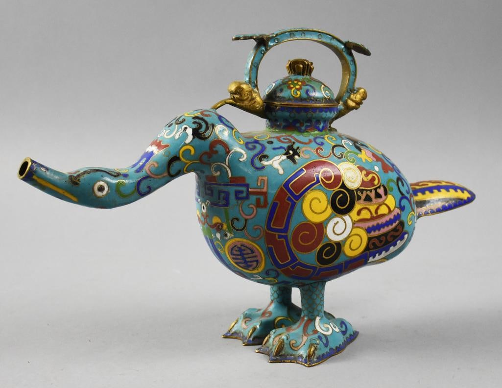 Antique Chinese Export Cloisonne Duck Teapot w/ Lid: Fantastic antique Chinese export teapot. This duck shaped teapot of cloisonne, blue ground with colorful good luck symbols, scrolls, spirals and animals. Complete with lid, no visible marks. Measures 