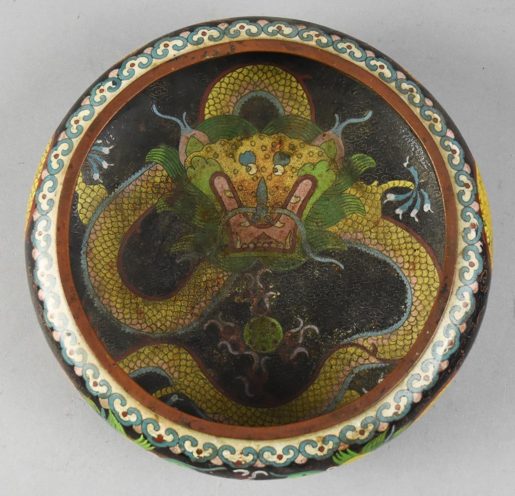 19th Century Qing Dynasty Cloisonne Dragon Bowl: Stunning cloisonne bowl from the late 19th to early 20th century, China. Appears to be Qing Dynasty. Black ground with multicolor enameling to forms a dragon. The outer design of Imperial dragons with