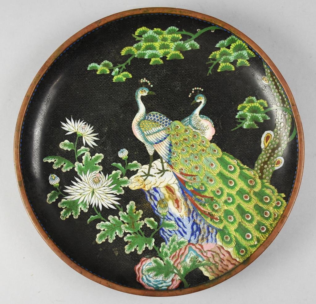 Antique Chinese Cloisonne Peacock Tray: Gorgeous antique cloisonne tray from China. Black ground with vibrant greens, blues and reds in peacock motif. Outer bands are turquoise and blue ground. No visible marks and measures approx. 14" x 2"