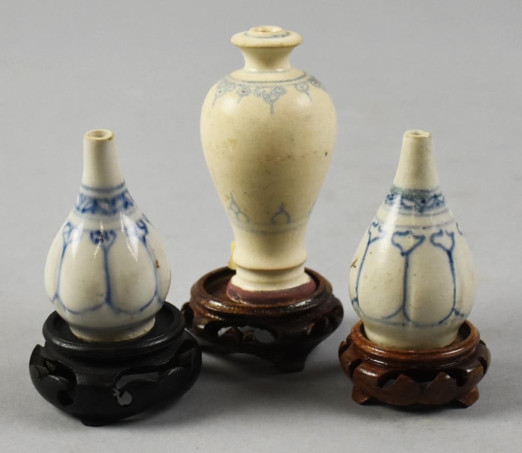15th C Vietnamese Hoi An Hoard Blue & White Bottles: These wonderful little bottles are from the mid 1400s recovered from the Hoi an Hoard shipwreck. Each piece is blue and white porcelain. The two pear shaped gourd bottles with hanging motifs. The cent