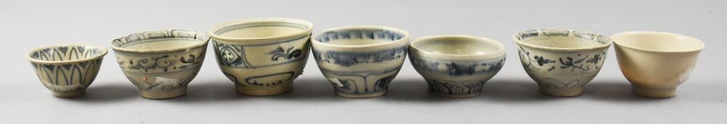 15th C Vietnamese Hoi An Hoard Blue & White Cups: This collection of seven ceremonial style cups, six are hand decorated with floral details and one is plain. Each retains the Butterfield's auction sticker and the barcode given when originally recove