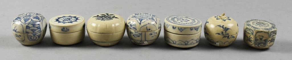 15th C Vietnamese Hoi An Hoard Blue & White Lidded Jars: Seven of these beautiful lidded jars are all hand decorated, all with floral motifs. All retain their original Butterfield's stickers and most with their barcodes from when they were originally recove