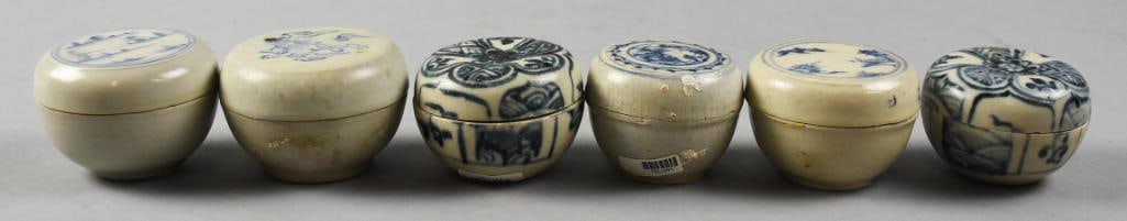 15th C Vietnamese Hoi An Hoard Blue & White Lidded Jars: Includes six assorted lidded jars in blue and white with various hand painted designs. They are adorned with flowers and landscapes with two jars having pattern throughout. Each retains the original s