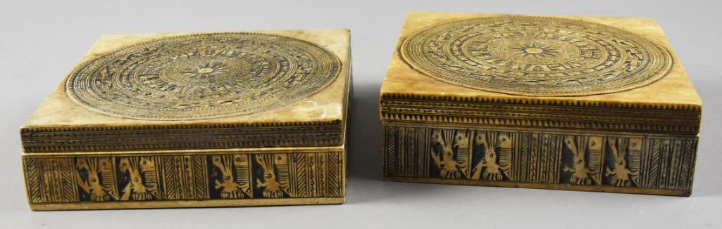 Vintage Vietnamese Carved Soapstone Trinket Boxes: Wonderful vintage Vietnamese carved trinket boxes. They appear to be soapstone with the images of Dong So'n drums on the lids and the sides having birds. Both appear hand carved and measure approx. 2.