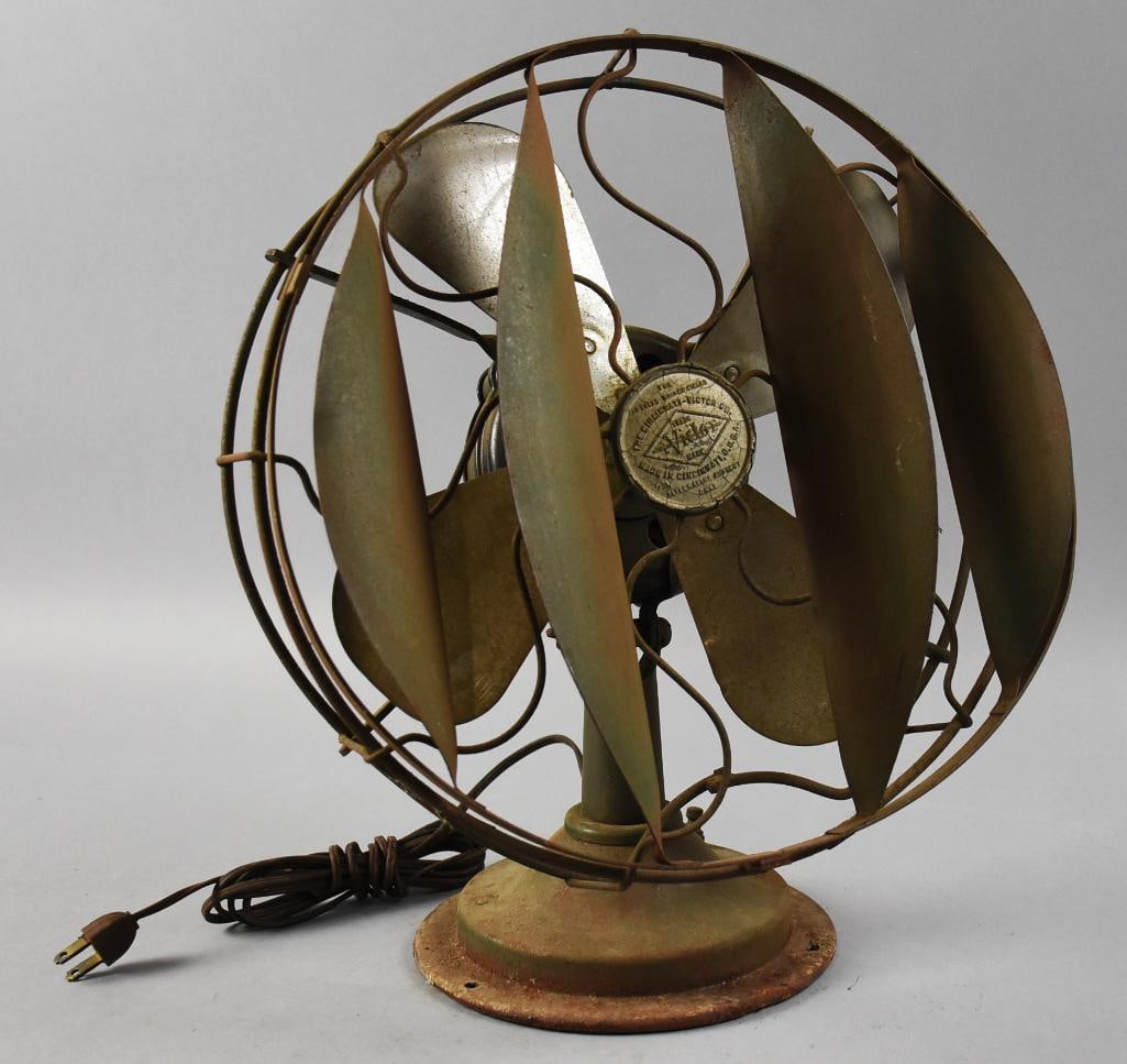 Cincinnati Victor Co Victor Alternating Current Fan: Wonderful antique fan from Cincinnati Victor Co. It is an alternating current only fan with curved louvers on the cage, called breeze spreaders. Parts appear to be cast steel with a cast iron base. Do