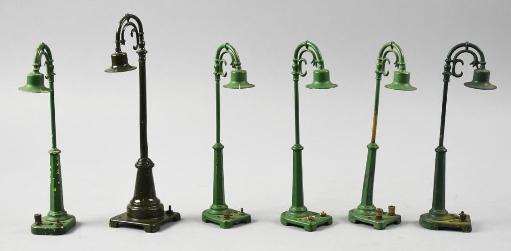 Pre-War Lionel No. 58 and No. 59 Lamp Posts: This lot is for some very nice pre-war Lionel lamp posts. There are five No. 58 that are approx. 7.5" tall and one No. 59 that is approx. 9" tall.