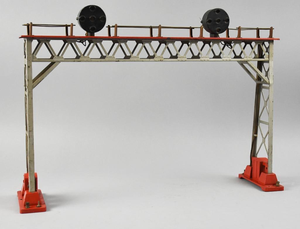Pre-War Lionel Corp. Signal Bridge No. 440N: Very nice vintage Lionel Corp Signal Bridge. It is No. 440N, first introduced in 1932 and remained in the catalog until 1942. Original signal heads across the top walkway, pressed metal trusses and re