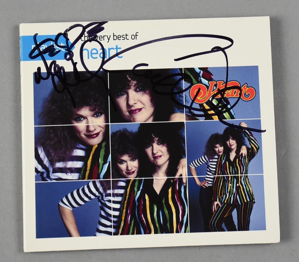 Heart, Ann & Nancy Wilson Signed Best of CD w/ Case: Awesome The Very Best of Heart CD signed by sisters Ann and Nancy Wilson. Seattle band formed in 1976 with numerous hits and elected into the Rock & Roll Hall of Fame. CD features some of their