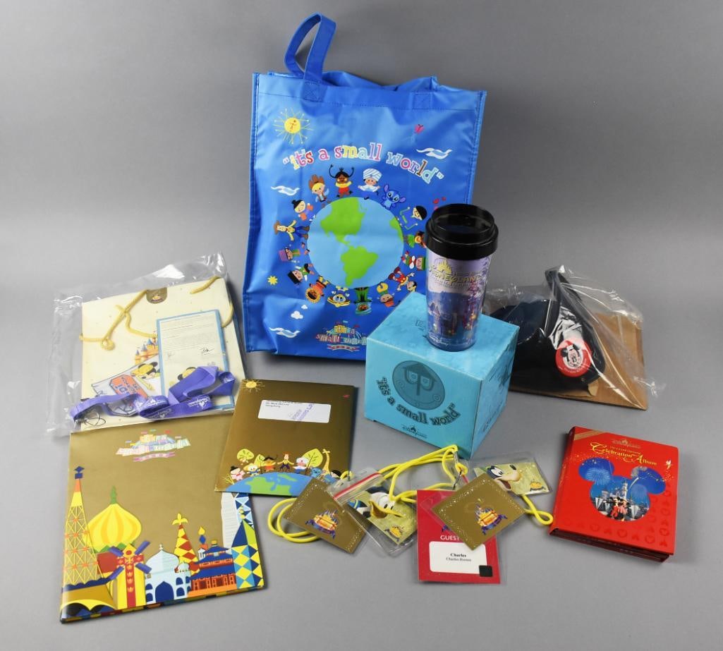 Disneyland Hong Kong Small World Opening Cast Member Gifts: All of these fun things appear to be cast member exclusives for the Disneyland Hong Kong Grand Opening of It's A Small World. Includes a Celebration Album CD set, ears, lanyard, gift bags, travel mug 