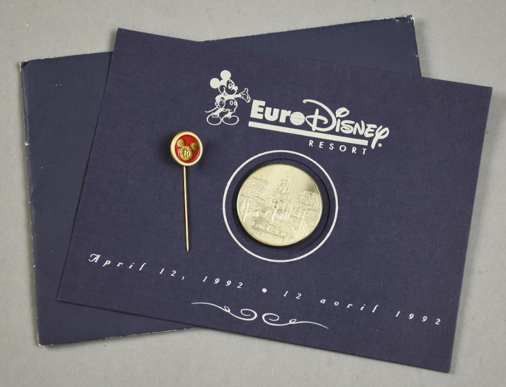 1992 Euro-Disney Grand Opening Commemorative Coin, Pin: Cool lot commemorating the April 12, 1992 opening of Euro-Disney. Includes a stick pin and commemorative coin in original packaging.