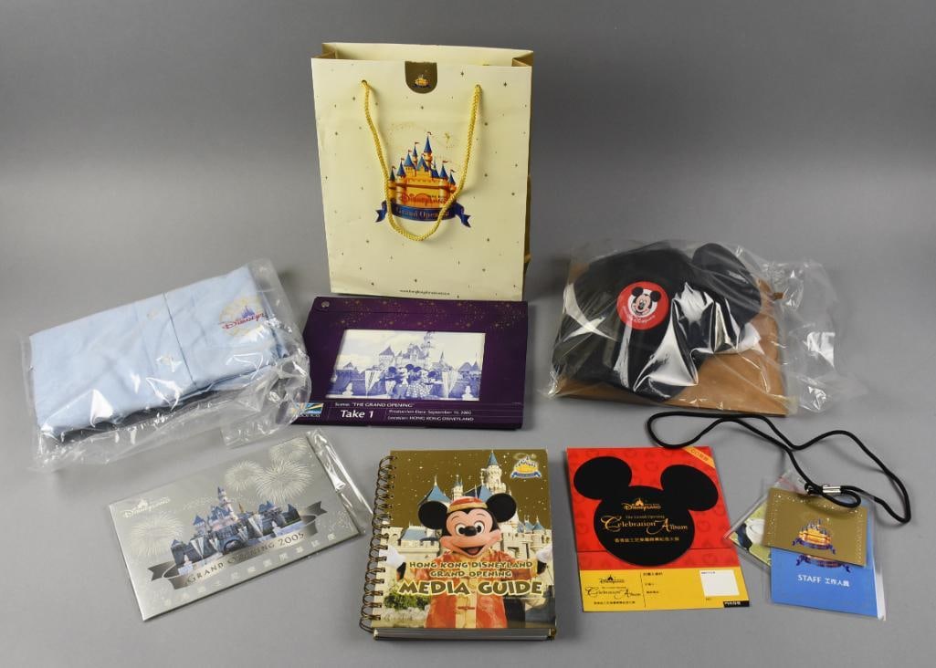 Disneyland Hong Kong Grand Opening Cast Member Kit: Fun collection of the grand opening of the Disneyland Hong Kong location. Cast member kit includes ears, shirt, celebration album, lanyard and more.