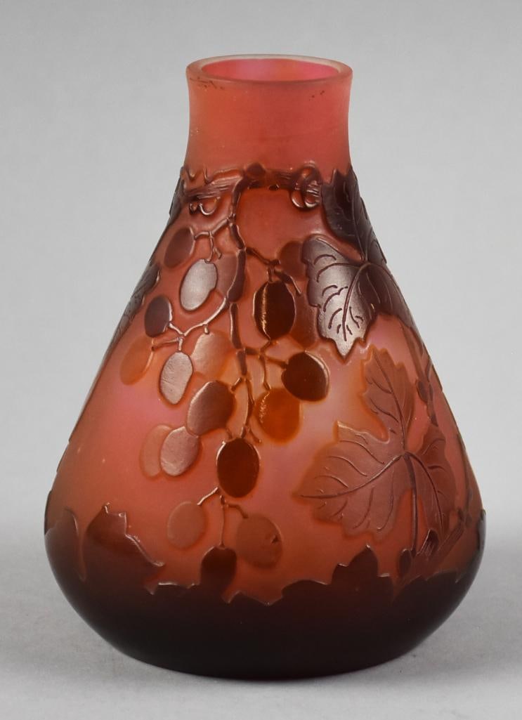 c1905 Emile Galle Cameo Glass Grapes & Vines Vase, Orig Label: Wonderful antique glass vase from Emile Galle. Cameo glass, burgundy in color is in grape clusters and grape vines. Pear shaped body, visible signature on side and retains the original label on base.