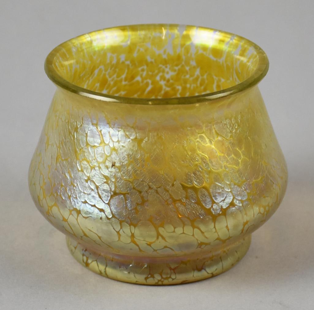 1898 Loetz Art Glass Candia Papillon Candle Holder: Beautiful antique Loetz art glass from the 1898 Candia line, Papillon. It is a speckled iridescent?gold crackle pattern.Has a bulbous base with a flared rim. It is unmarked but does have a hand