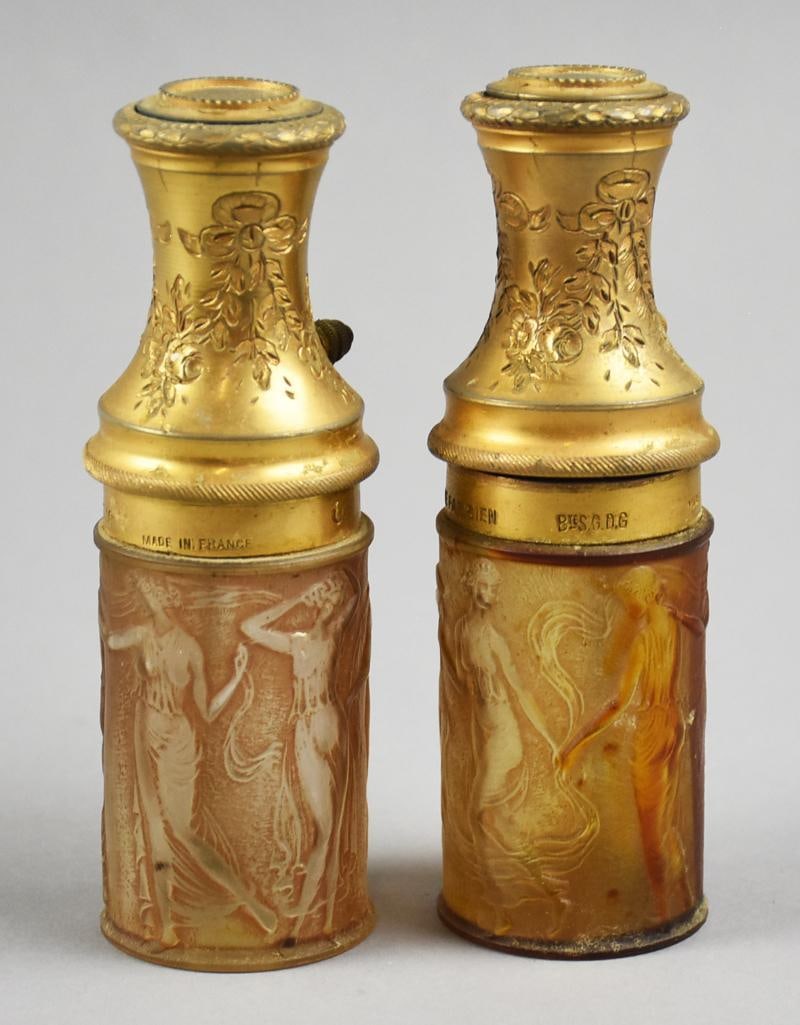c1925 Lalique Figurines et Guirlandes Le Parisien Atomizer: This is a stunning pair of Lalique perfume bottles. They are Figurines et Guirlandes (Figurines)??with dancing women draped in cloth. Frosted glass, amber in color. They are marked on the collar Le