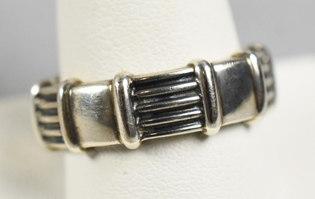 David Yurman Sterling Industrial Design Ring: Awesome ring from jewelry designer David Yurman. It is a band ring with an industrial design. Stamped inside the band and is an approx. size 9.