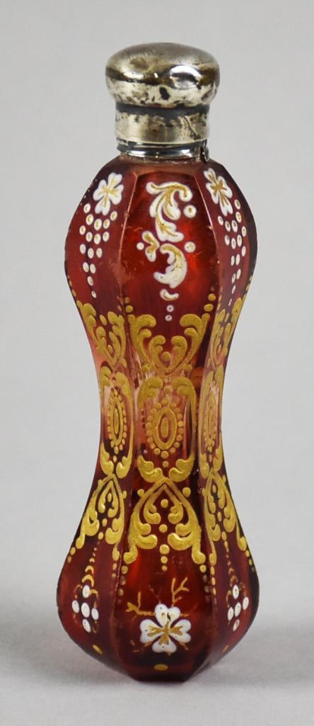 1888 Birmingham Sterling Ruby & Enamel Scent Bottle: This gorgeous bottle is Bohemian glass in ruby red with gold and white hand painted enamel scrolls and flowers. The cap is Birmingham sterling with the lion passant and anchor, lower case old English 