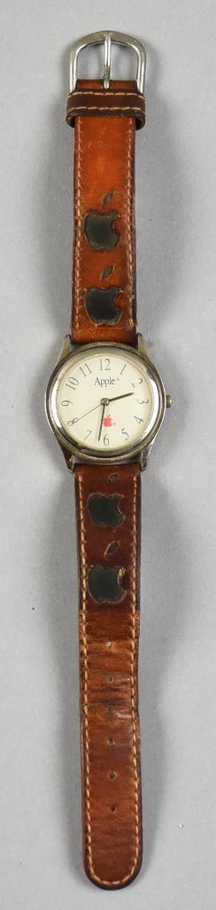 Vintage Apple Computer Rainbow Logo Promo Wristwatch: Very cool vintage watch for Apple. It was a 1990s promotional item with the red apple logo on the dial. The leather band appears original with the same Apple logo embossed. Watch with new battery.