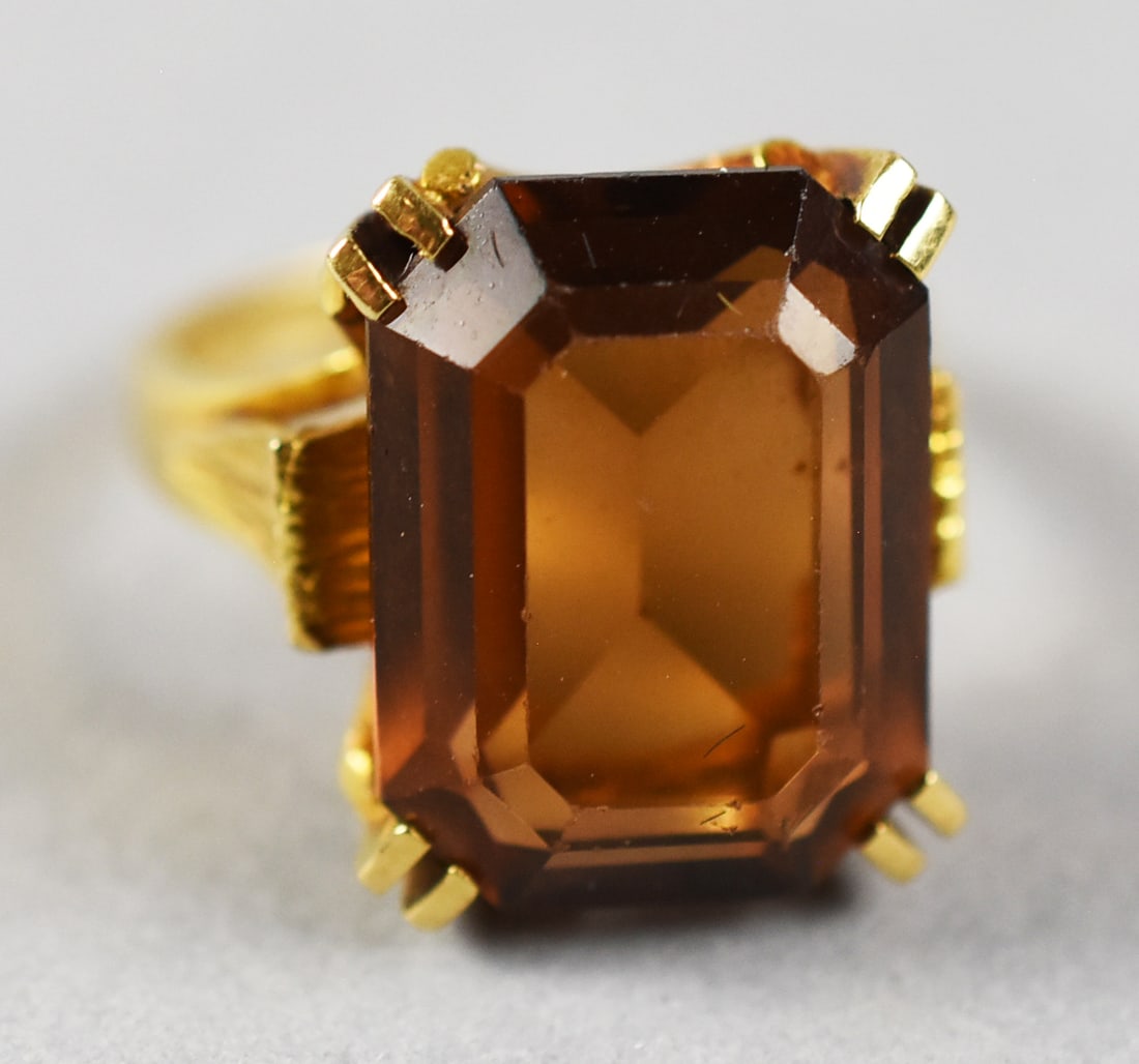 18K Gold Large Emerald-Cut Citrine Cocktail Ring: A bold vintage-style cocktail ring crafted in 18K yellow gold and centered by a substantial rectangular step-cut citrine measuring approximately 12mm x 16mm. The richly colored gemstone displays warm 