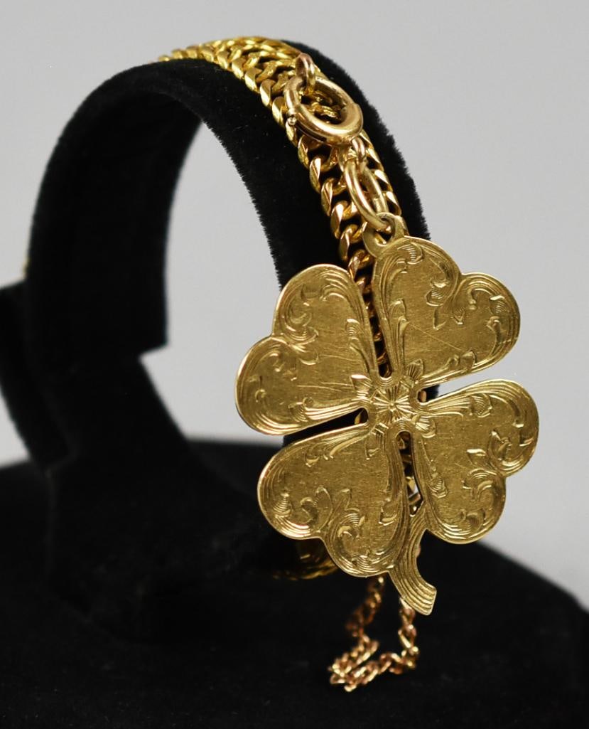 14k & 10K Lucky 4 Leaf Clover Bracelet: Want to feel lucky all the time? You can with this 10k gold bracelet with a 14k gold 4 leaf clover attached to it. 10k gold bracelet weights 1.3g and 14k gold charm is 6.7g. Bracelet is 7" long.
