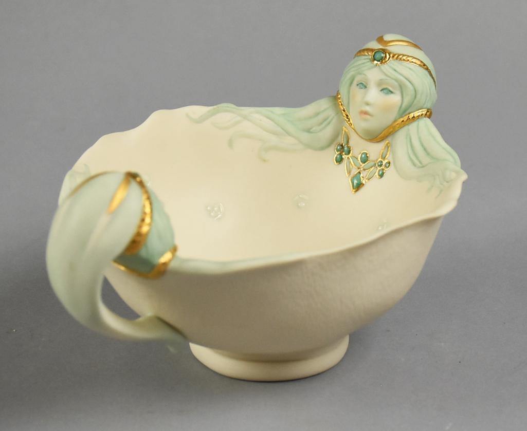 Vintage Cybis Twins Gemini Porcelain Bowl: This great piece is scarce from Cybis USA. It is called Twins Gemini with the twins facing one another, berries and leaves in the bowl. Pale green paint with gold and gemstone adornments. Hand signed 