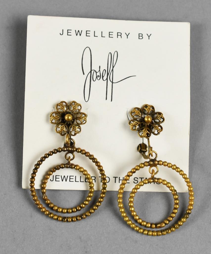 Vintage Joseff of Hollywood Clip On Earrings: Beautiful pair of earrings from Joseff of Hollywood. These earrings are clip on with bead style hoop with flowers. They come on the original card.Purchased by consignor from one of the designers of Jo