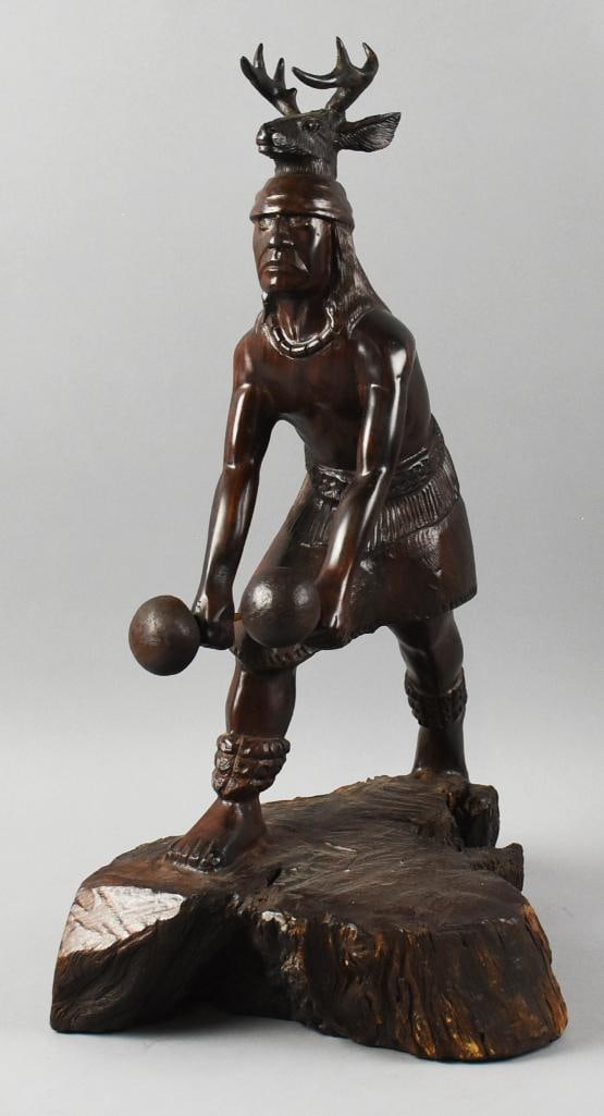 Vintage Mexican Ironwood Yaqui Deer Dancer: Wonderful vintage sculpture from Mexico. Material appears to be ironwood of a Yaqui Deer Dancer. Figure appears hand carved with a deer hat and holding a pair of maracas. Highly polished with no visib