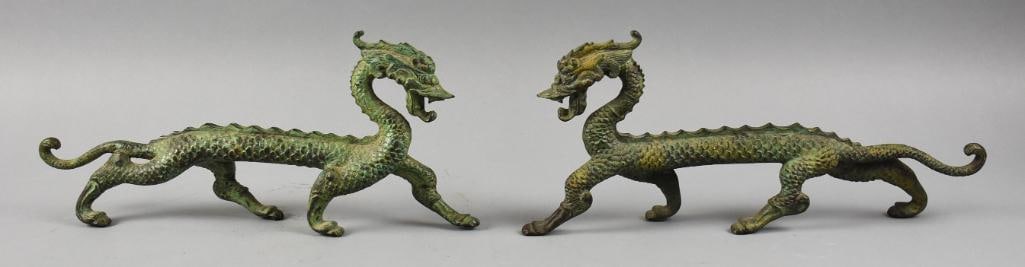 Antique Chinese Bronze Walking Dragon Brush Rests: Very cool pair of dragons from China. They appear to be bronze and are used as brush rests or just decorative items. They have no visible marks and measure approx. 5.5" x 13".