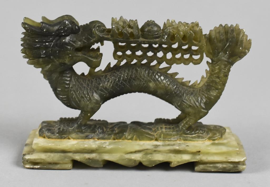 Vintage Chinese Carved Jade Dragon Figure: Very nice vintage dragon figure from China. Dragon appears hand carved in spinach jade and attached to a base that also appears jade. No visible marks, measures approx. 3" x 5" x 2". From the estate o
