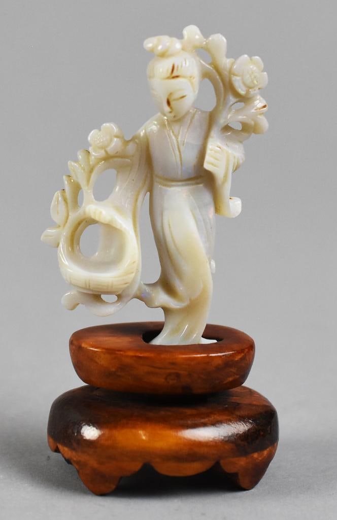Beautiful Opal Hand Carved Guanyin Figurine: She is a beautiful Guanyin from China. She is opal and appears to be hand carved. Includes her own custom solid wood stand. Stands approx. 3" tall. From the estate of a collector of excellent and ecle