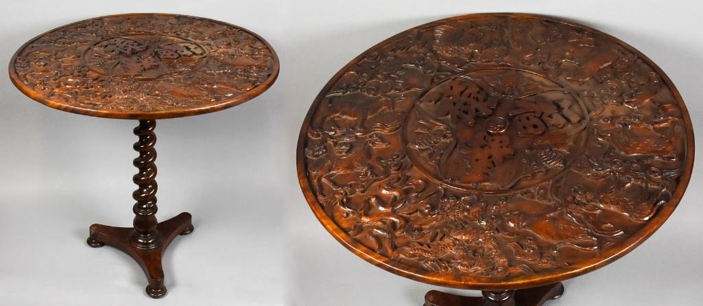 Early 20th Chinese Occasional Carved Wood Table: Wonderful vintage hand-carved wood Chinese occasional table with carved bats and Chinese symbols in the top. Symbols are traditionally good luck, longevity and traditional Chinese blessings. Symbols a